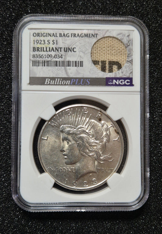 1923 Peace Dollar - Brilliant Uncirculated, with Rare Inked Bag Fragment. Certified by NGC.