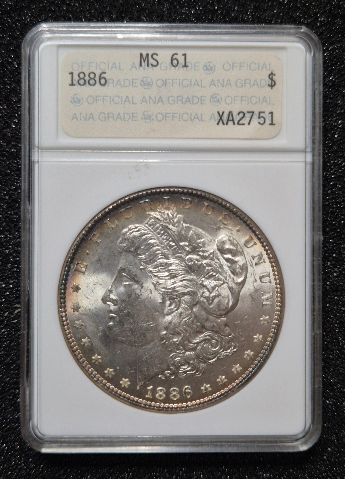 1886 Morgan Silver Dollar graded MS61 by the ANA Certification Service (note the older ANA soapbox slab).