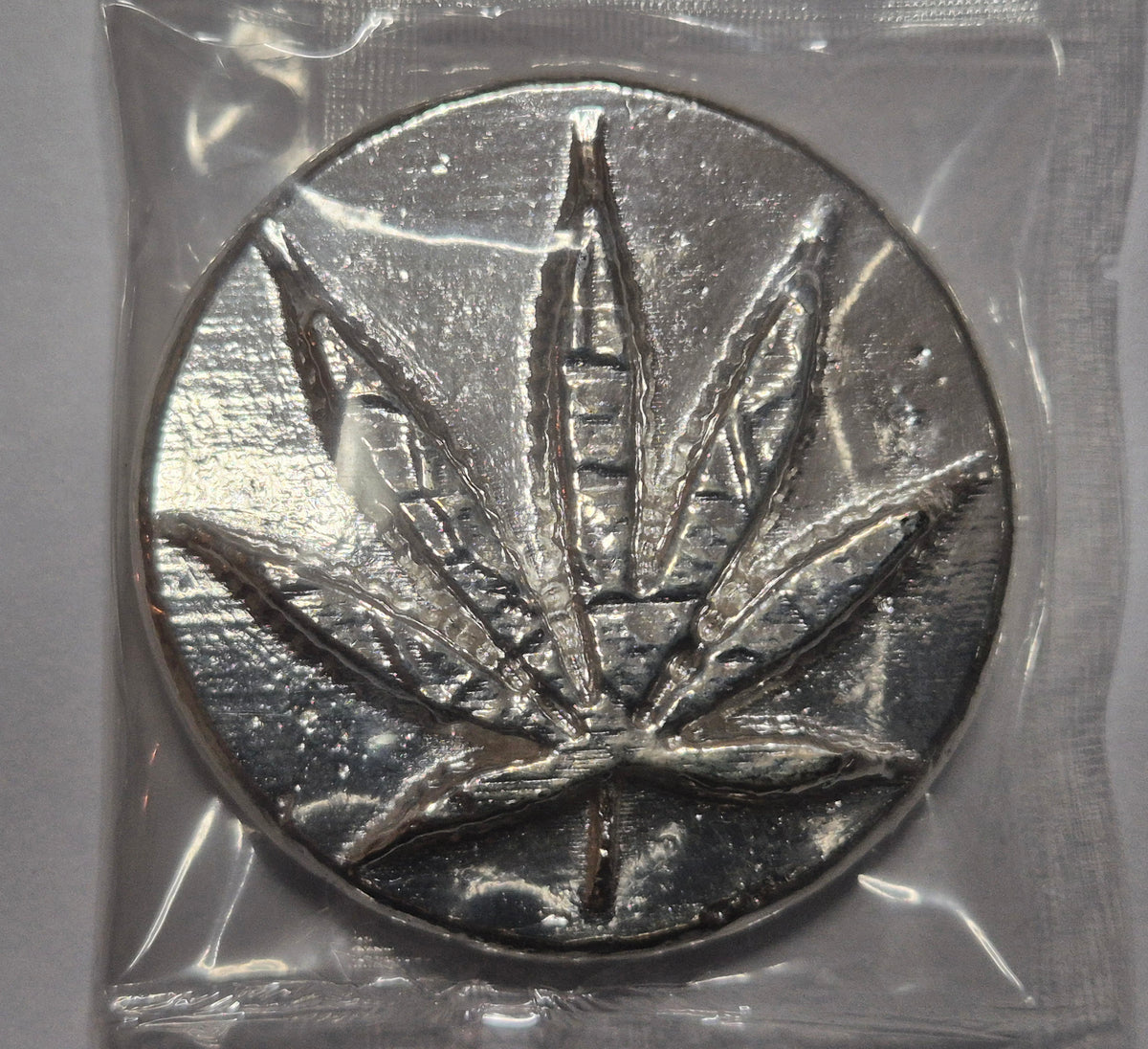 4 oz .999 Fine Silver Cannabis Leaf Round – Mile High Mint – Hand Poured – Serial #77